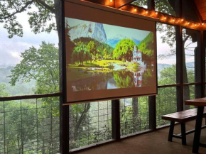 Treehouse Cabin with Mountain, River Views and Arcades